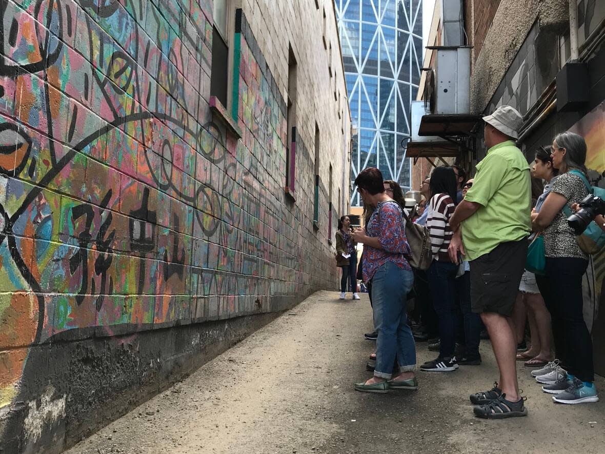 A Jane's Walk focused on some of the murals in Calgary in 2018. (Submitted by Amani Khatu - image credit)