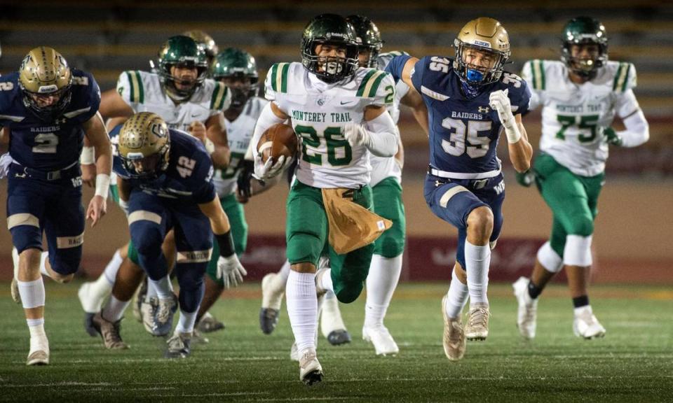 Monterey Trail’s Daelin Ellis (26) makes his way to the end zone with an 80-yard sprint during the first quarter against Central Catholic of Modesto on Saturday, Nov. 27, 2021 during the CIF Sac-Joaquin Division II championship game at Hughes Stadium in Sacramento. Ellis will return next year.