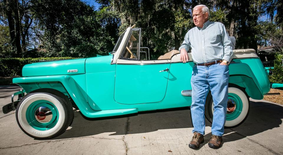 Frank Amatea of Ocala leans against his 1948 Jeepster on Monday. He will be showing it in the George Albright Marion County Tax Collector 12th annual Charity Car Show on Feb. 26 at the McPherson Governmental Complex, 503 SE 25th Ave., Ocala. Proceeds from the event support Marion County charities.