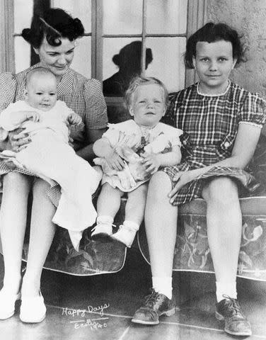 <p>Bettmann Archive</p> Sandra Day O'Connor (right) poses on the family ranch in 1940 with mother Ada Mae Day, brother Alan and sister Ann