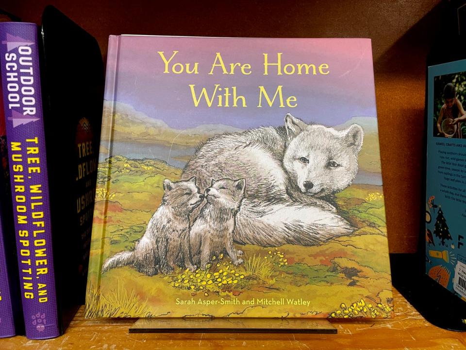 The children's book ‘You Are Home With Me’, illustrated by Mitchell Thomas Watley, is shown at a bookstore in Portland (AP)