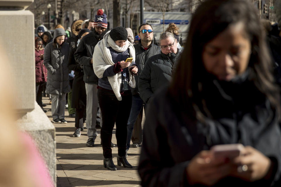 Furloughed government workers affected by the shutdown wait in line for free food and supplies at World Central Kitchen, the not-for-profit organization started by Chef Jose Andres, Tuesday, Jan. 22, 2019, in Washington. (Photo: ASSOCIATED PRESS)