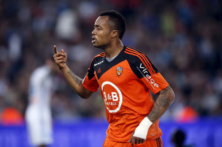 Lorient's Jordan Ayew celebrates after scoring against Olympique Marseille during their French Ligue 1 soccer match at the Velodrome stadium in Marseille, France April 24, 2015. REUTERS/Jean-Paul Pelissier