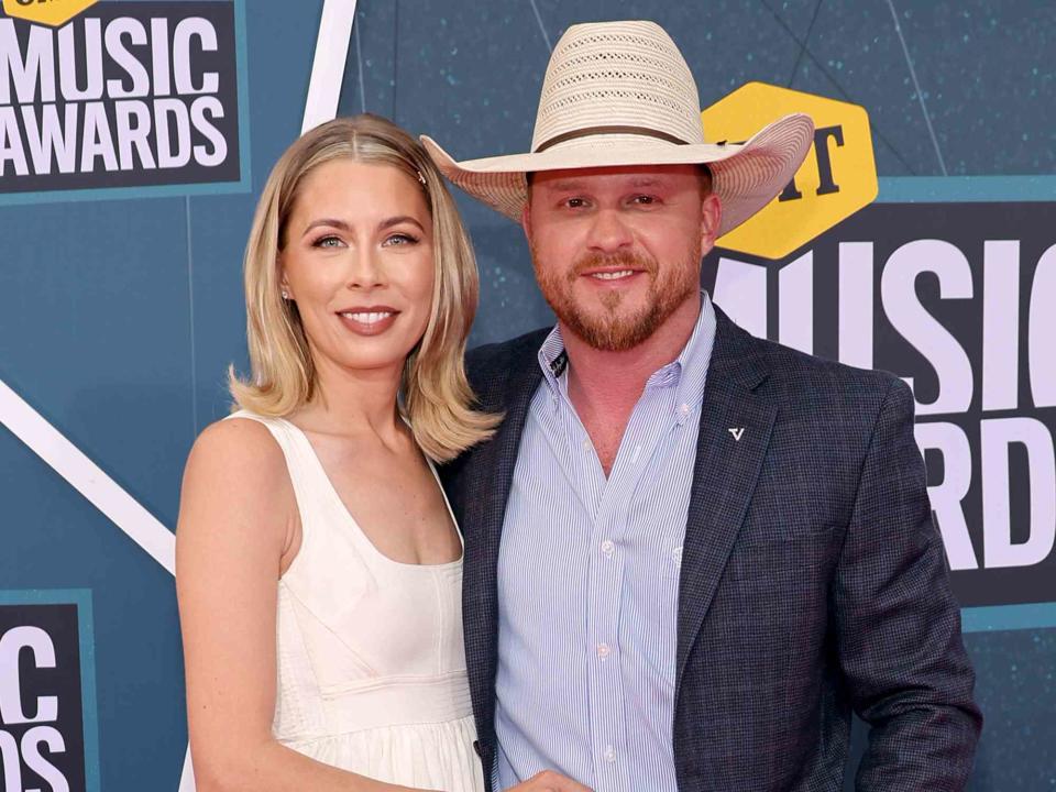 <p>Mike Coppola/Getty </p> Cody Johnson with his wife, Brandi Johnson, at the 2022 CMT Music Awards in Nashville, Tennessee.