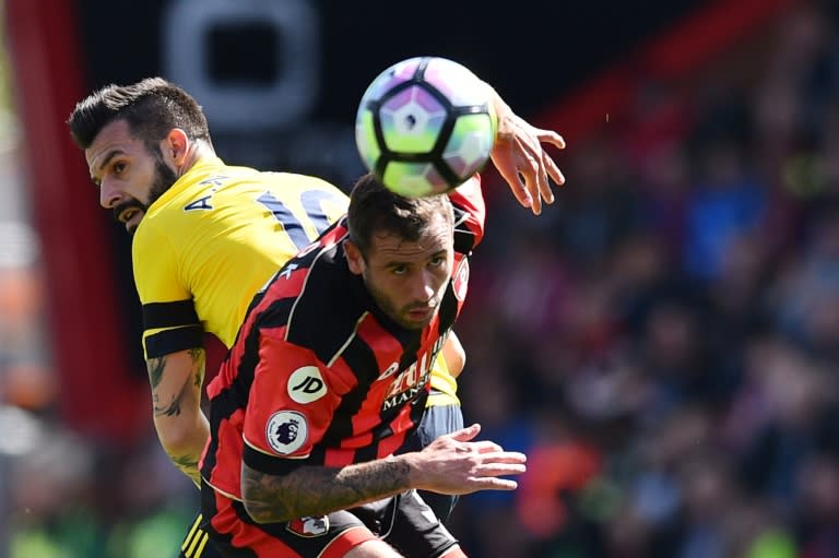 Middlesbrough's Alvaro Negredo (L) vies with Bournemouth's George Friend during their English Premier League football match at the Vitaly Stadium in Bournemouth, southern England on April 22, 2017