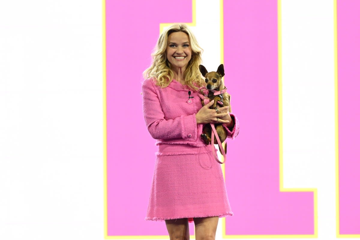 Reese Witherspoon in character as Elle Woods with Bruiser the dog (Slaven Vlasic / Getty Images for Amazon)
