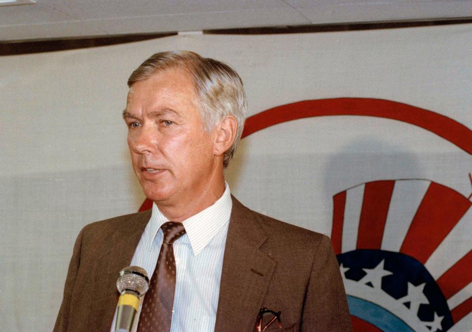 New York Yankees general manager Gene Michael answers questions at a news conference Aug. 21, 1990, in New York.