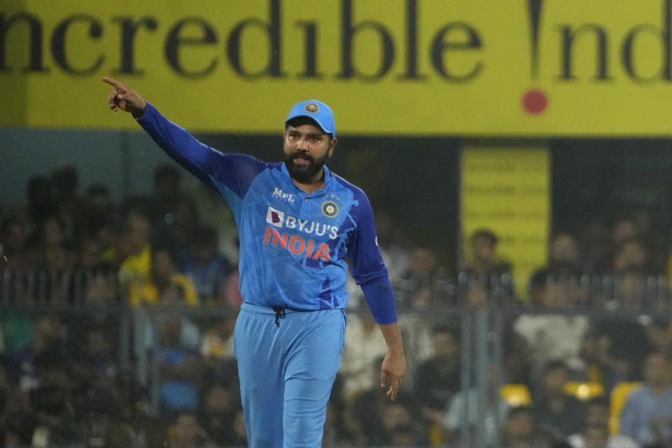 India's captain Rohit Sharma gestures to his teammates during the second T20 cricket match between India and South Africa, in Guwahati, India, Sunday, Oct. 2, 2022. (AP Photo/Anupam Nath)