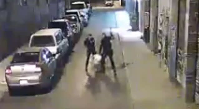 The video shows the two officers beating the man with their fists and weapons. Photo: Screenshot