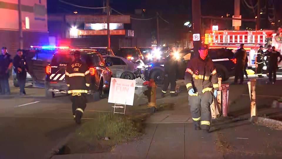 Seattle police said the crash happened during the recovery of a stolen car and a suspect is in custody.