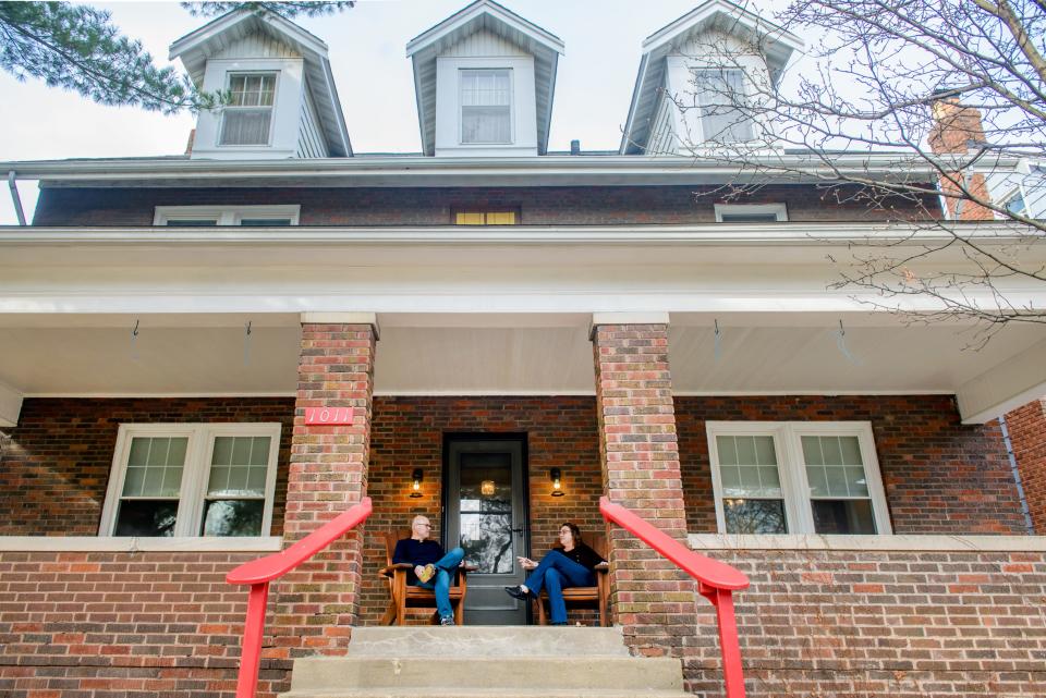 Bill and Terri Sheets sit on the front porch of their house at 1011 N. Farmington Road in Peoria, the childhood home of journalist, activist and founder of the National Organization for Women Betty Friedan. The Sheets have put the house on the market in an effort to downsize.