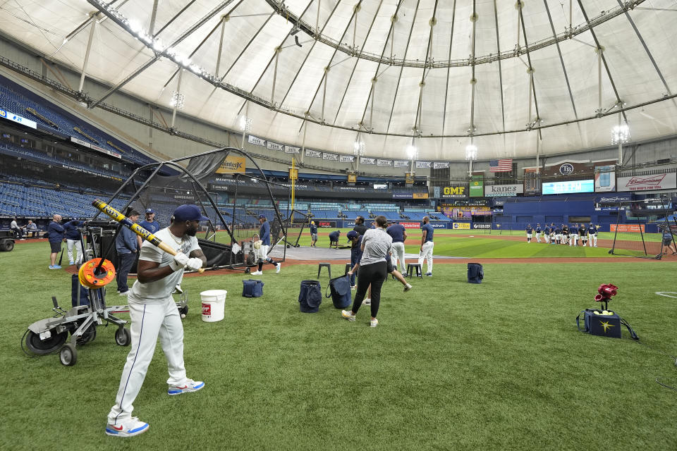 Tampa Bay Rays players take batting practice before a baseball game between the Rays and the Detroit Tigers Wednesday, April 24, 2024, at Tropicana Field in St. Petersburg, Fla. The future of the Tampa Bay Rays should come into clear focus in the coming weeks as the St. Petersburg City Council begins discussions about the $1.3 billion ballpark that would open for the 2028 baseball season. The stadium is the linchpin of a much larger project that would transform the downtown with affordable housing, a Black history museum, office and retail space. (AP Photo/Chris O'Meara)