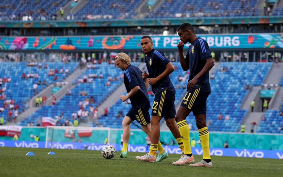 Emil Forsberg, Robin Quaison and Alexander Isak (left to right) warm up together - GETTY IMAGES