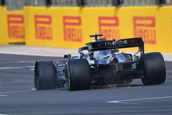 Hamilton crossed the line to win the British Grand Prix with a puncture (AFP via Getty)