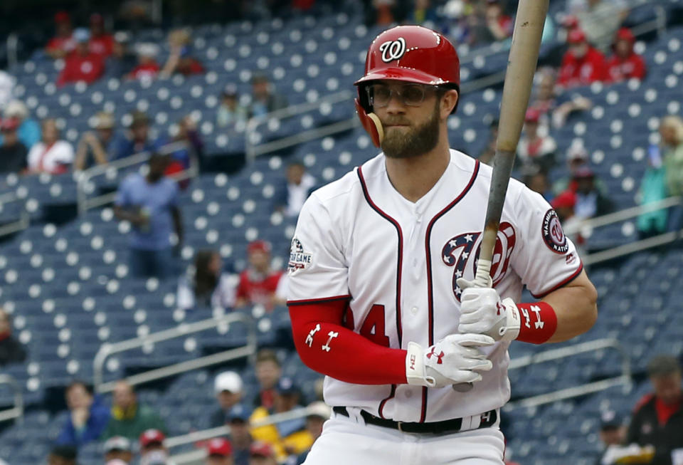 Washington Nationals' Bryce Harper wears glasses to bat during the first inning of the first baseball game of a doubleheader against the Los Angeles Dodgers at Nationals Park, Saturday, May 19, 2018, in Washington. (AP Photo/Alex Brandon)