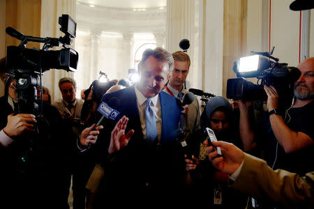 Senator Jeff Flake (R-AZ) speaks to reporters after announcing he will not run for re-election, on Capitol Hill in Washington, U.S., October 24, 2017. REUTERS/Joshua Roberts