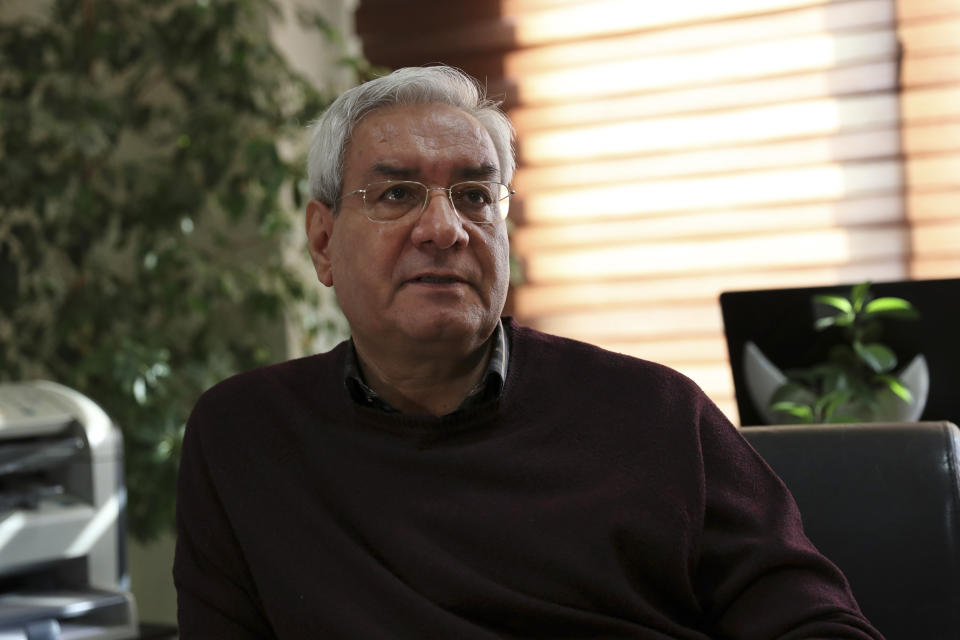 In this Oct. 29, 2019, photo, Ebrahim Asgharzadeh, one of the Iranian student leaders of the 1979 U.S. Embassy takeover, speaks in an interview with The Associated Press, in Tehran, Iran. Asgharzadeh says he now regrets the seizure of the diplomatic compound and the 444-day hostage crisis that followed. (AP Photo/Vahid Salemi)