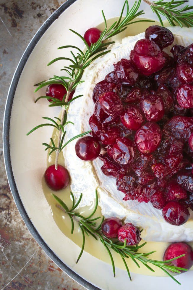 <strong>Get the <a href="http://theviewfromgreatisland.com/baked-brie-with-maple-roasted-cranberries/" target="_blank">Baked Brie With Maple Roasted Cranberries recipe</a> from The View From Great Island</strong>