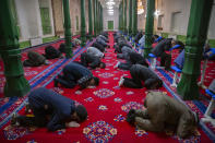 Uyghurs and other members of the faithful pray during services at the Id Kah Mosque in Kashgar in western China's Xinjiang Uyghur Autonomous Region, as seen during a government organized visit for foreign journalists on April 19, 2021. Under the weight of official policies, the future of Islam appears precarious in Xinjiang, a remote region facing Central Asia in China's northwest corner. Outside observers say scores of mosques have been demolished, which Beijing denies, and locals say the number of worshippers is on the decline. (AP Photo/Mark Schiefelbein)