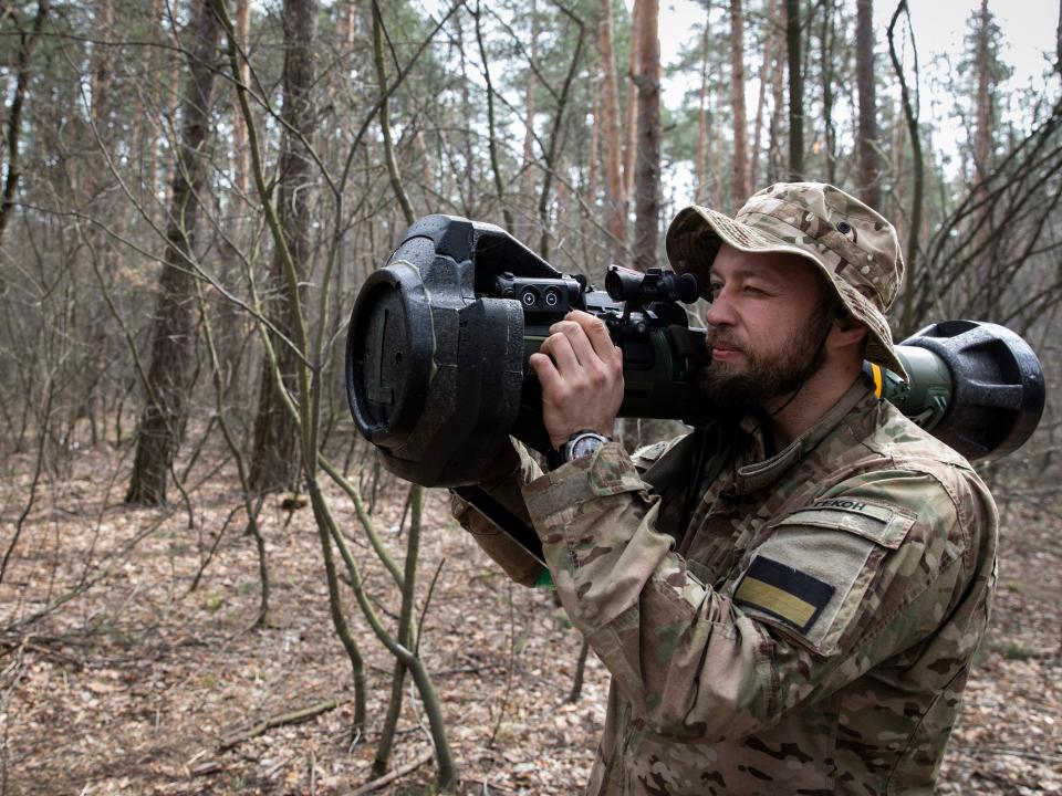 Oleg, a Ukrainian soldier, demonstrates a next generation light anti-tank weapon provided by the UK