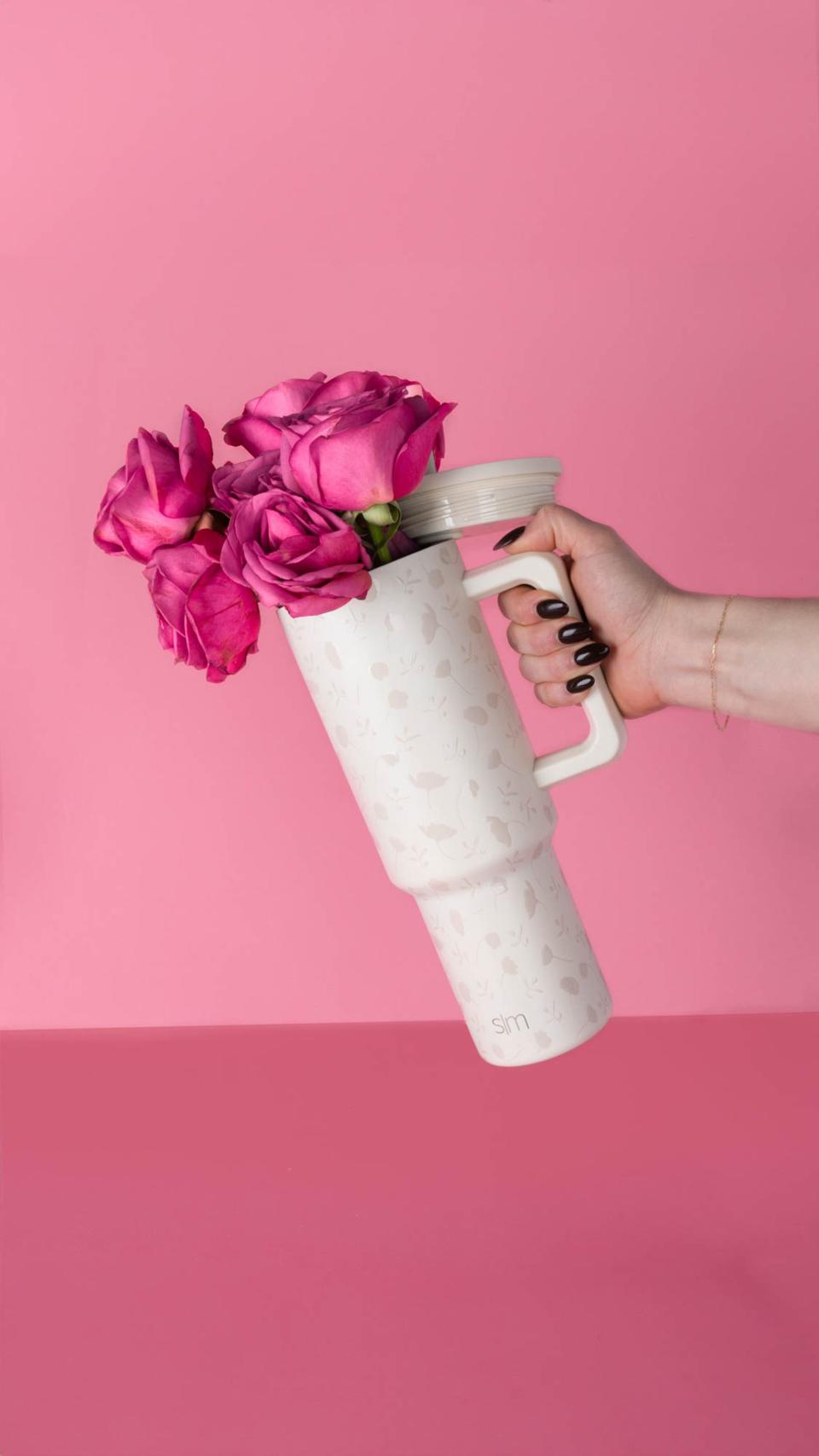 A Simple Modern 40 oz trek tumbler featuring a floral design for Valentine's Day 2024.