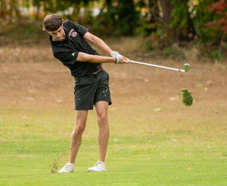 Maynard High School senior Will Fowler hits on the first fairway during a match against Hudson at the Maynard Golf Course Thursday.