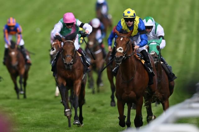 Who will join last year's winner Desert Crown on the Epsom Derby roll of honour?