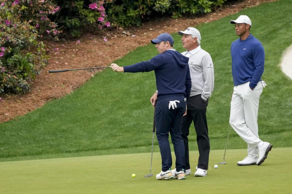 Apr 3, 2023; Augusta, Georgia, USA; Rory McIlroy, Fred Couples and Tiger Woods stand on the 13th green during a practice round for The Masters golf tournament at Augusta National Golf Club. Mandatory Credit: Michael Madrid-USA TODAY Network

Pga The Masters Practice Round