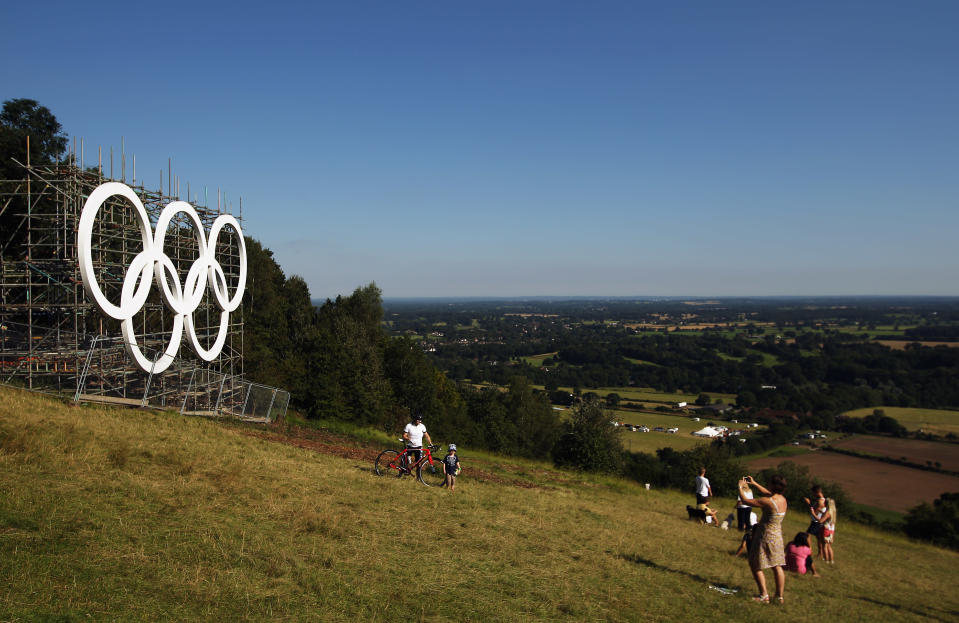 The Olympic rings are seen at the top of Box Hill on July 24, 2012 in Surrey, England. (Photo by Bryn Lennon/Getty Images). Box Hill features prominently in the route of the Olympic cycling road races. The men will climb it nine times and the women twice. (Photo by Bryn Lennon/Getty Images)