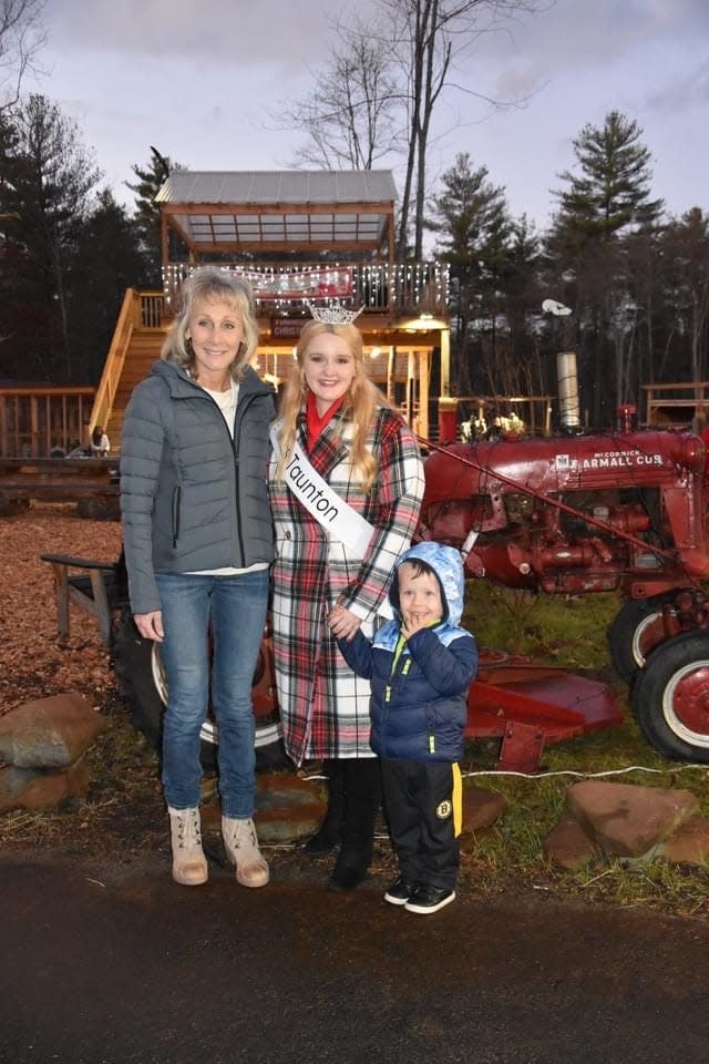 Miss Taunton 2023 Lily Jeswald, right, attended the holiday opening for Deep Pond Farm and Stables in East Taunton, as did Taunton Mayor Shaunna O'Connell, left. Also pictured is Jeswald's nephew, Brady Pelland.