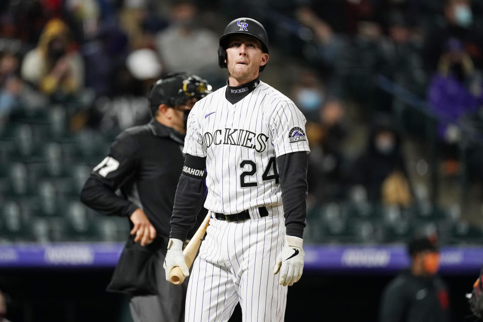 Colorado Rockies' Ryan McMahon reacts after striking out to end in the fifth inning of game two of a baseball doubleheader Tuesday, May 4, 2021, in Denver. (AP Photo/David Zalubowski)