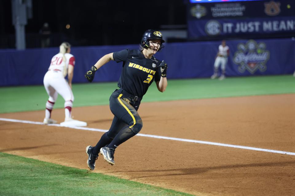 May 9, 2024; Auburn, AL, USA; Missouri Tigers shortstop Jenna Laird (3) rounds third base on the way to home against the Arkansas Razorbacks in the quarterfinals of the SEC Softball Championship at Jane B. Moore Field. Mandatory Credit: John Reed-USA TODAY Sports