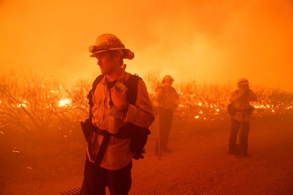 PHOTO: Firefighters work against the advancing Post Fire on June 16, 2024, in Gorman, Calif.  (Eric Thayer/AP)