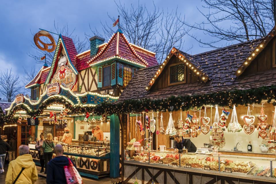 People strolling among the individually designed alpine chalets at the Christmas market of Southampton. (Getty Images)