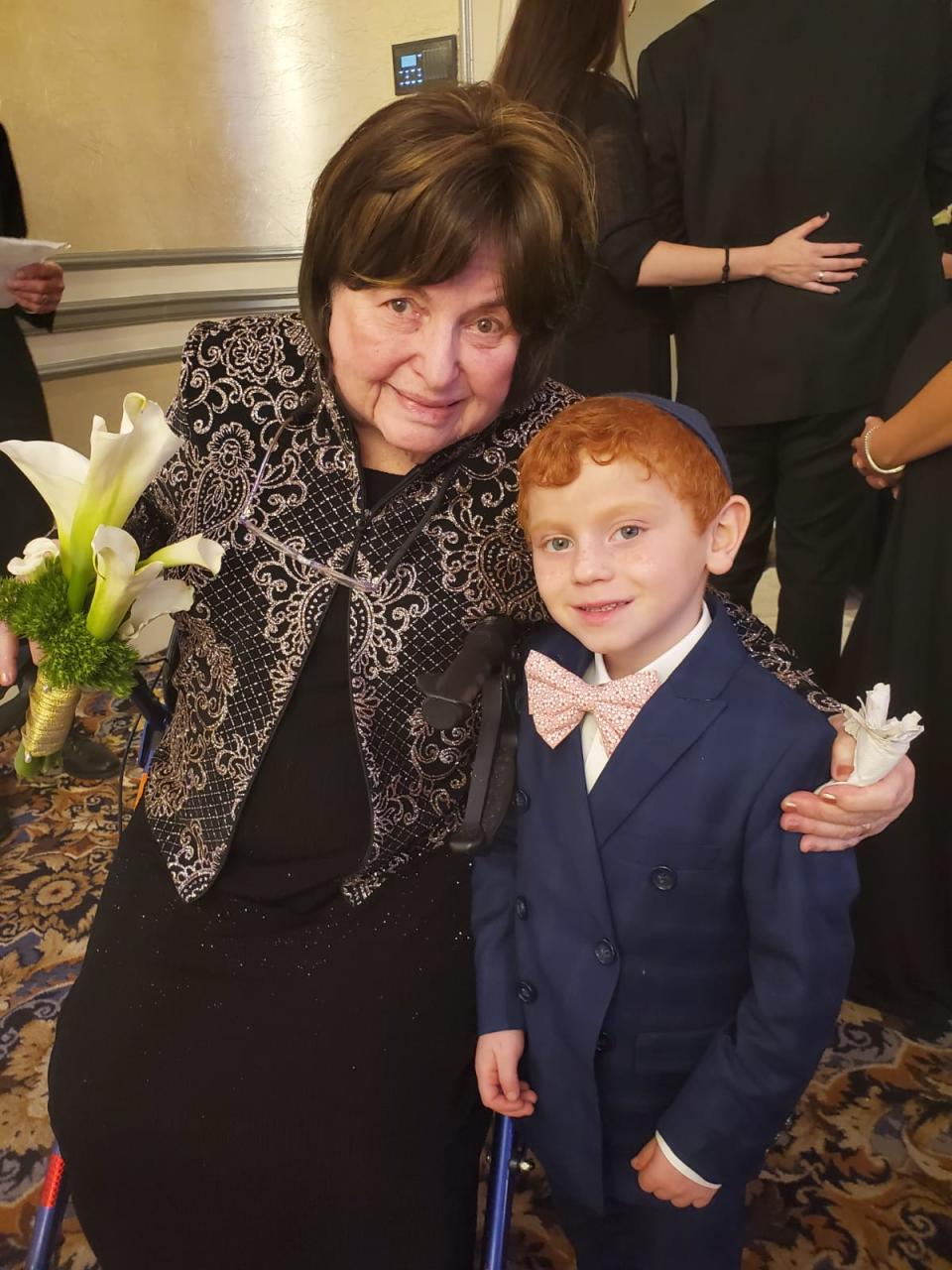 Lenora Garfinkel of Monsey with one of her dozens of great-grandchildren.