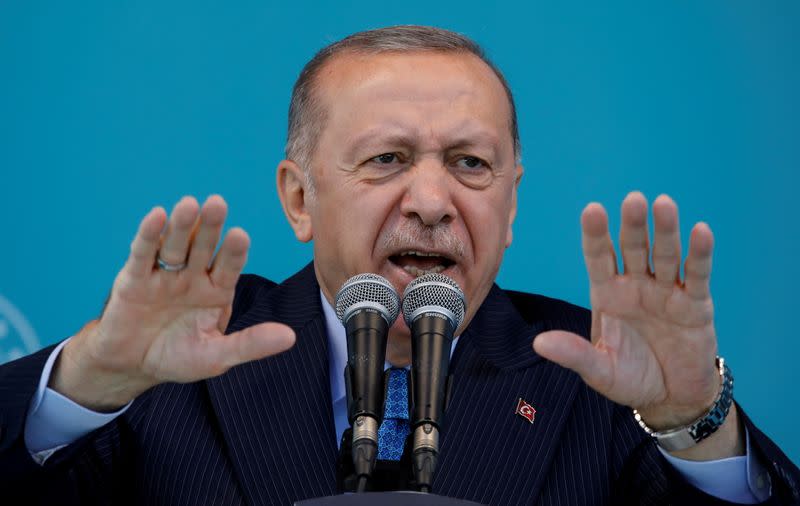 FILE PHOTO: Turkish President Tayyip Erdogan addresses his supporters during a ceremony in Istanbul