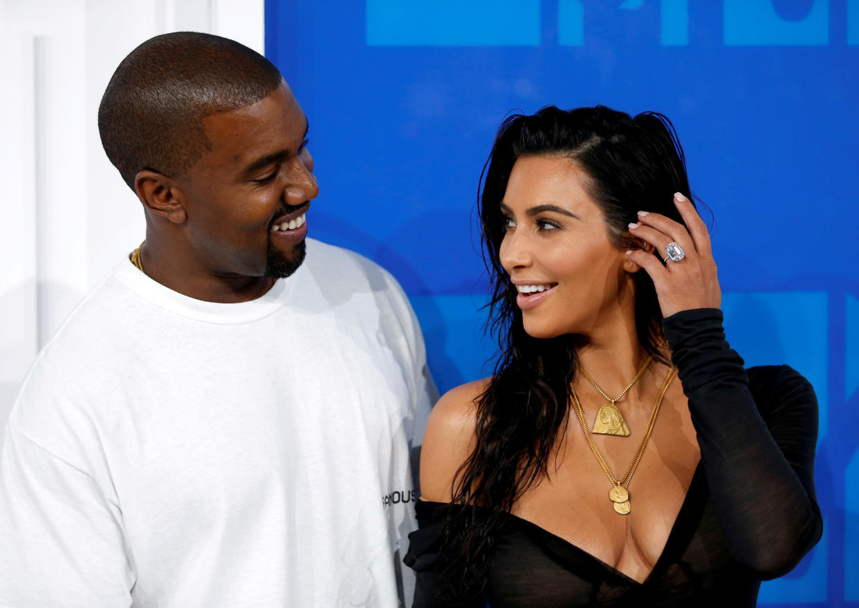 Kim Kardashian and Kanye West arrive at the 2016 MTV Video Music Awards in New York, U.S., August 28, 2016. 