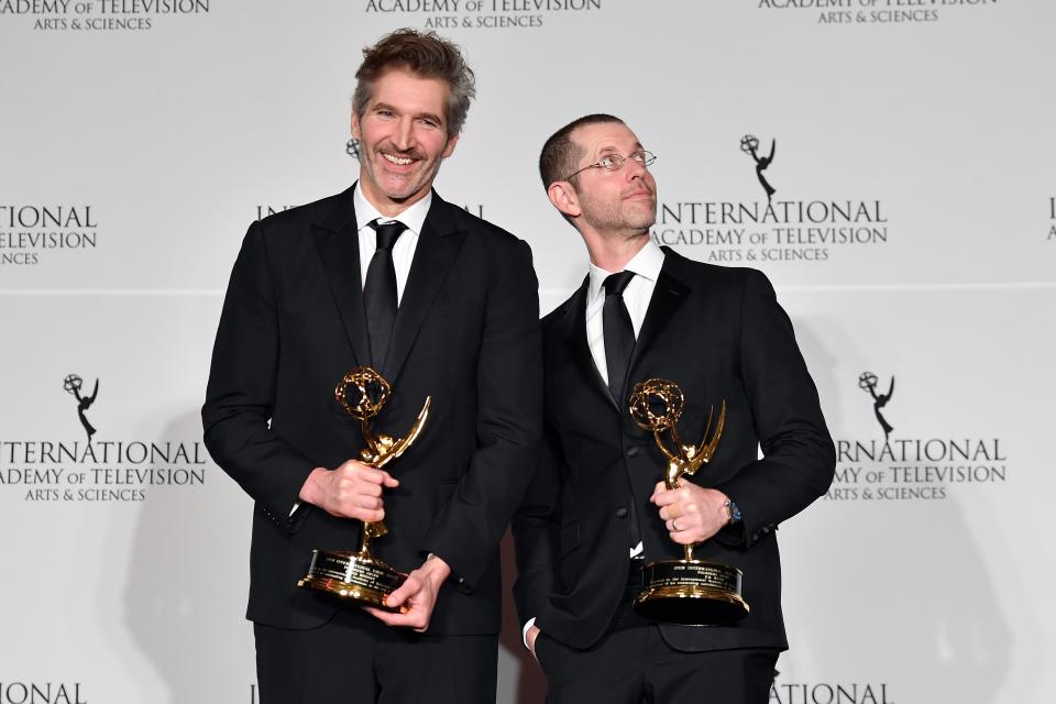 US screenwriters David Benioff (L) and D. B. Weiss (R) pose in the press room with the award for "Founders Award" for "Game of Thrones" during the 47th Annual International Emmy Awards at New York Hilton on November 25, 2019 in New York City. - The International Emmy Award is an award ceremony bestowed by the International Academy of Television Arts and Sciences in recognition to the best television programs initially produced and aired outside the United States. (Photo by Angela Weiss / AFP) (Photo by ANGELA WEISS/AFP via Getty Images)