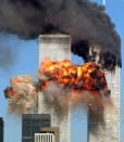 NEW YORK, NY - FILE: Hijacked United Airlines Flight 175 from Boston crashes into the south tower of the World Trade Center and explodes at 9:03 a.m. on September 11, 2001 in New York City. U.S. President Barack Obama announced the death of Osama Bin Laden during a late evening statement to the press May 1, 2011 in the East Room of the White House. Bin Laden has reportedly been killed near Islamabad, Pakistan, almost a decade after the terrorist attacks of September 11, 2001 and his body is in possession of the United States. (Photo by Spencer Platt/Getty Images)