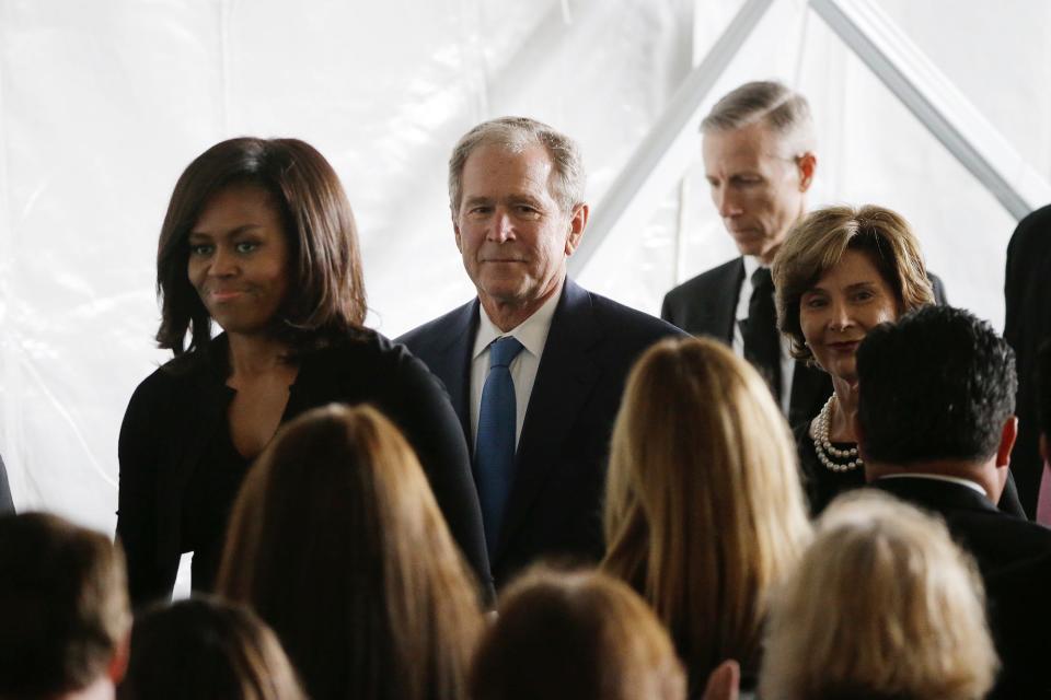First Lady Michelle Obama, from left, former President George W. Bush and Laura Bush leave the funeral service for former First Lady Nancy Reagan at the Ronald Reagan Presidential Library Friday, March 11, 2016, in Simi Valley, calif.