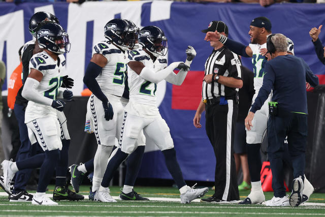 Rookie Devon Witherspoon scores on 97-yard pick six as Seahawks D