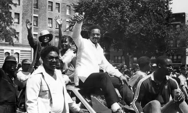 PHOTO: Civil Rights leader and politician Jesse Jackson gives a 'thumbs up' as he greets supporters from the roof of an car during the Bud Billiken parade, sponsored by the Chicago Defender, in Chicago, in 1985. (Robert Abbott Sengstacke/The Abbott Sengstacke Family Papers via Getty Images)