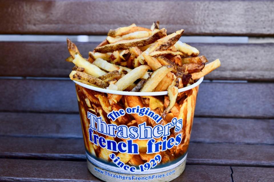 Large bucket of Thrasher's French Fries from the boardwalk in Ocean City, Maryland