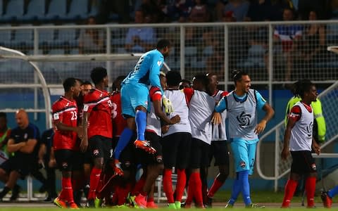 Trinidad and Tobago celebrate their second goal - Credit: Getty