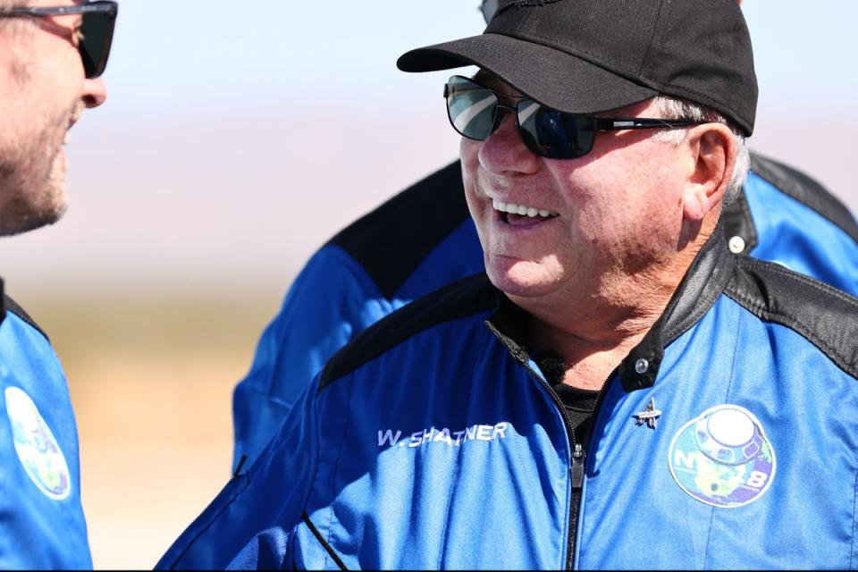 Shatner, on the landing pad of Blue Origin space capsule in 2021, became the oldest person to fly into space on the ten-minute flight (Getty Images)