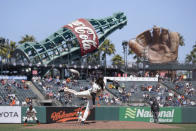 San Francisco Giants pitcher Johnny Cueto throws against the Cincinnati Reds during the sixth inning of a baseball game in San Francisco, Wednesday, April 14, 2021. (AP Photo/Jeff Chiu)