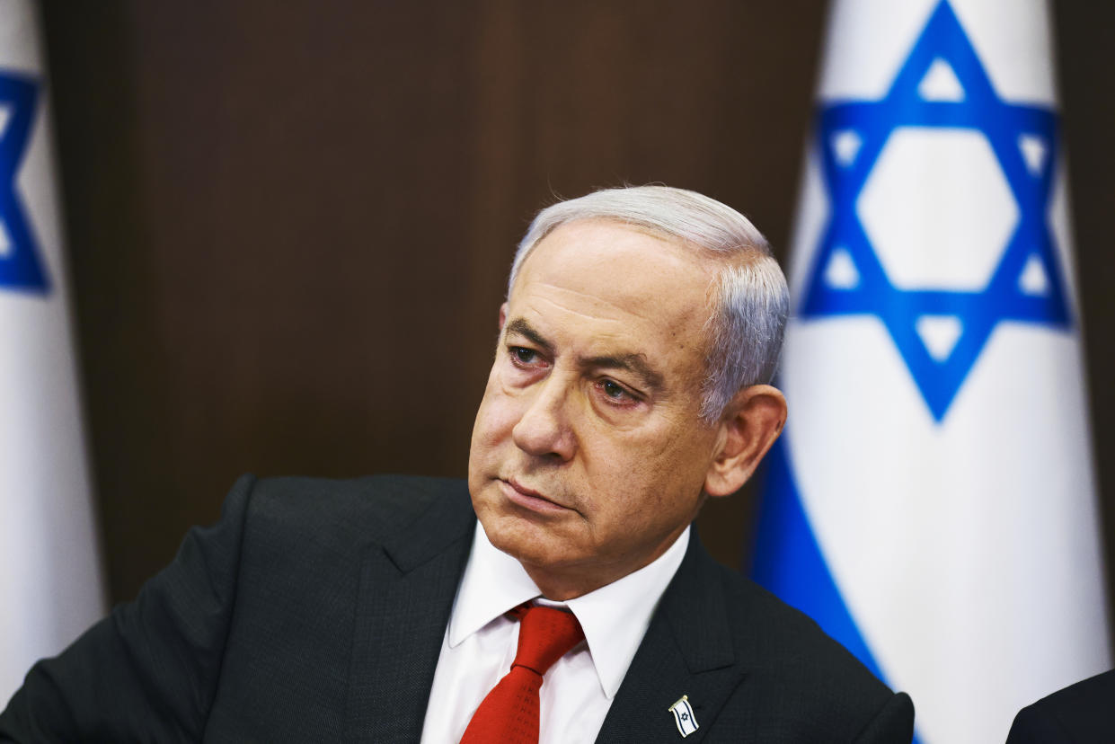 Israeli Prime Minister Benjamin Netanyahu convenes a weekly cabinet meeting at the Prime Minister's office in Jerusalem, Sunday, Jan. 8, 2023. (Ronen Zvulun/Pool Photo via AP)