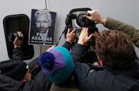 WikiLeaks' founder Julian Assange leaves Westminster Magistrates Court in London