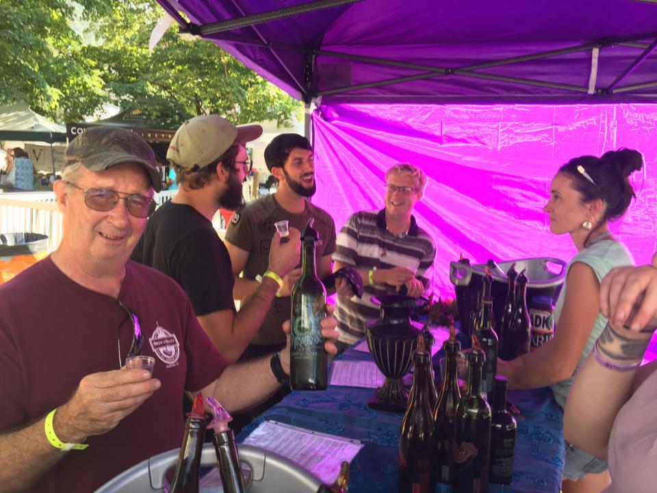 The Inspire Moore wine tent is a hopping place during the Naples Grape Festival, which takes places Sept. 24-25.