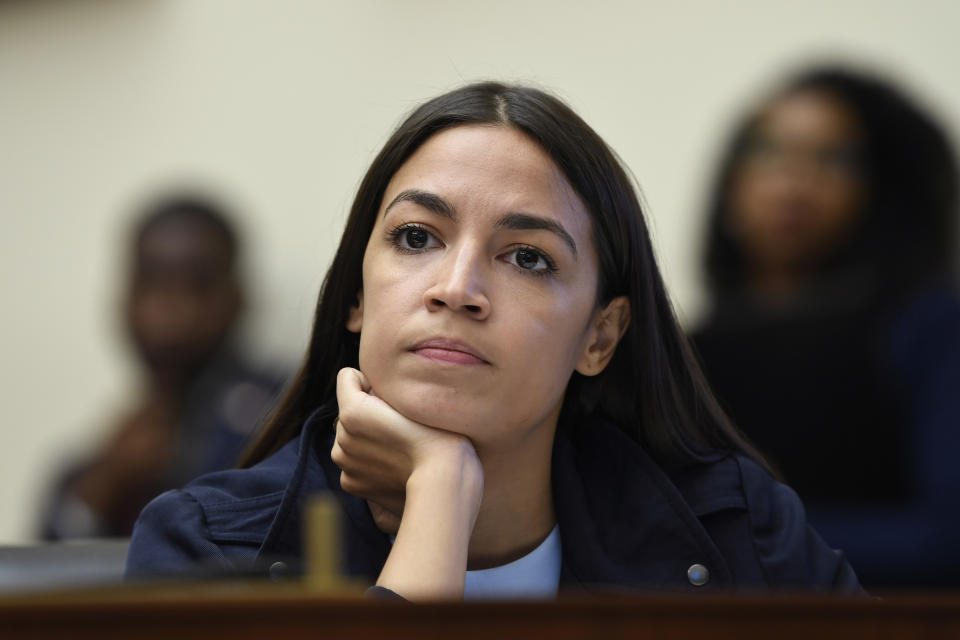 Rep. Alexandria Ocasio-Cortez, D-N.Y., listens as Federal Reserve Chairman Jerome Powell testifies before the House Financial Services Committee on Capitol Hill in Washington, Wednesday, July 10, 2019. (AP Photo/Susan Walsh)